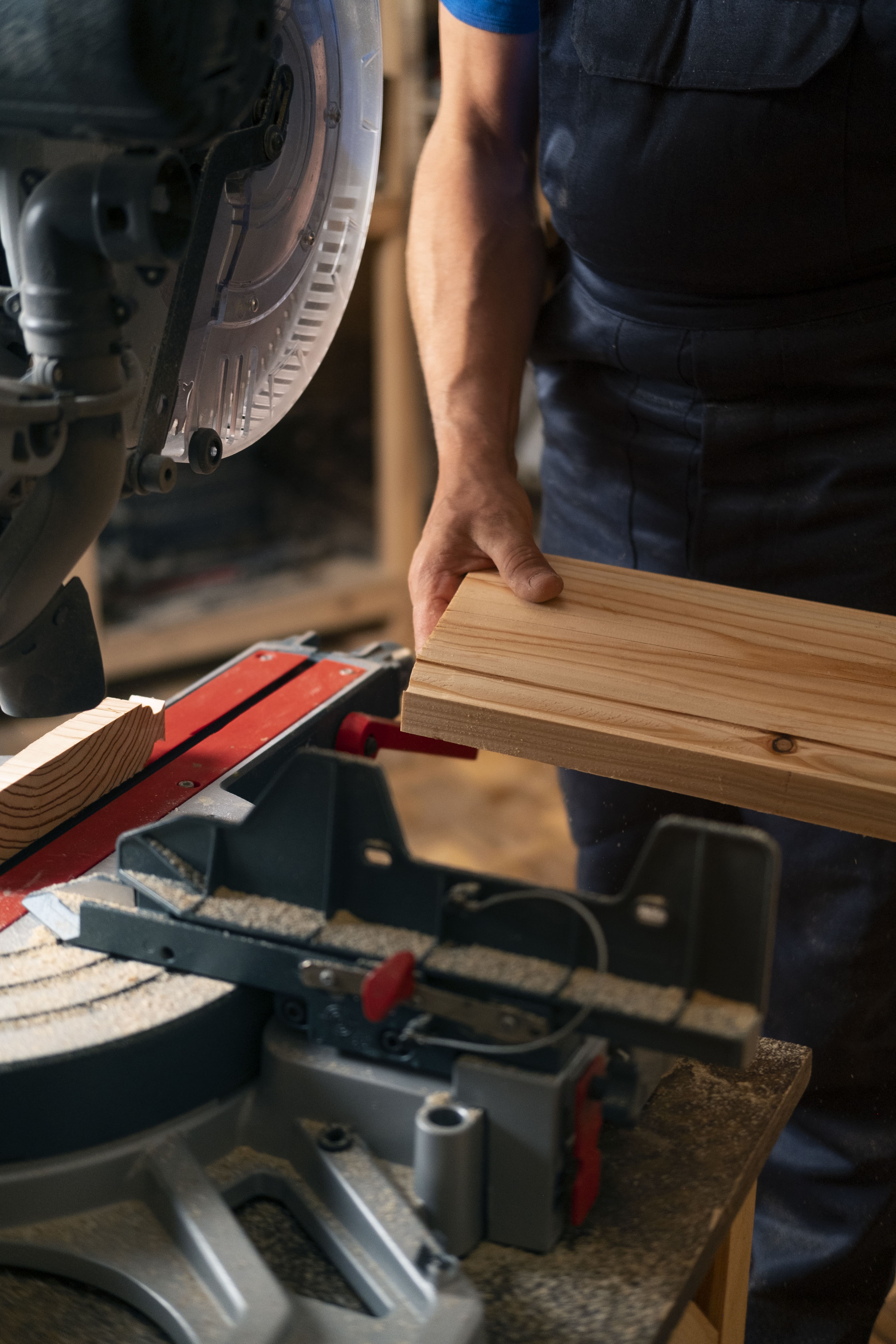 Carpenter using miter saw