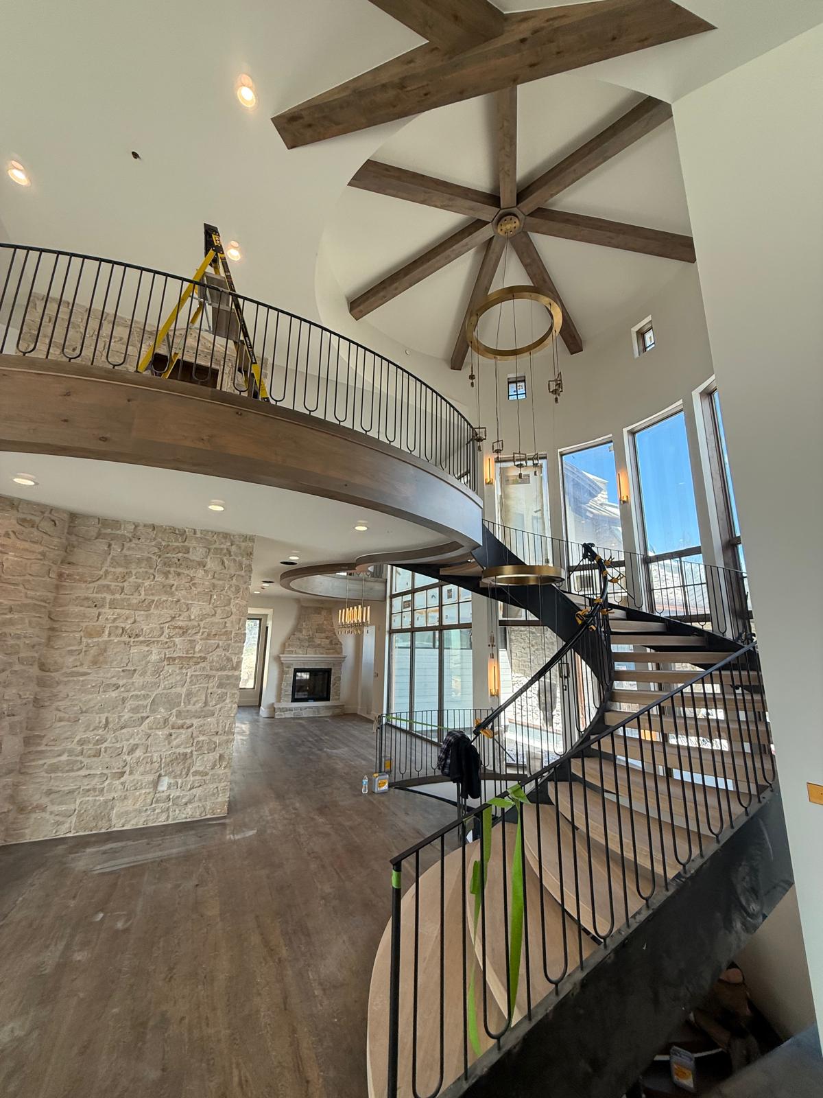Spiral staircase view from upper loft